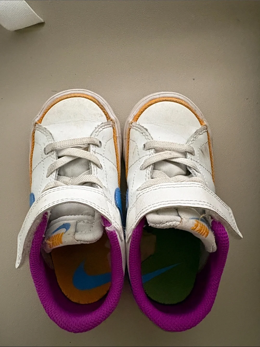 Nike Kids White Sneakers with Blue Swoosh & Purple Lining